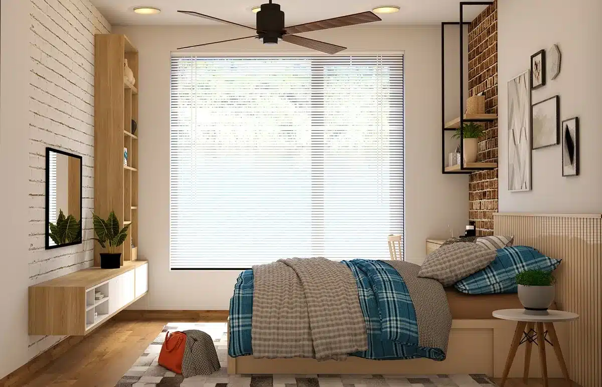 Camera da letto con coprimaterasso, igrometro sul comodino e deumidificatore